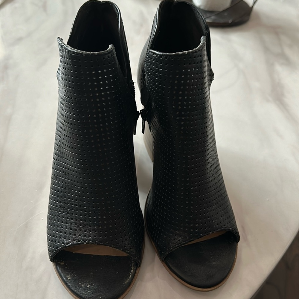 Black peep toe shoes by Coconuts by Matisse.  Perferated leather with zip side